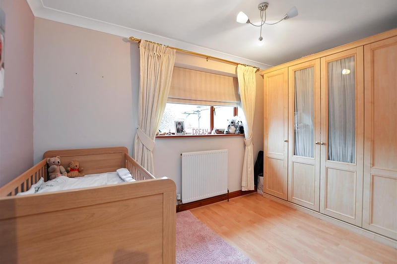 With radiator, laminate floor and double-glazed window to the front.