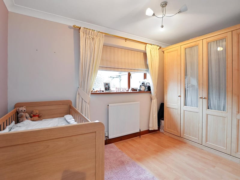 With radiator, laminate floor and double-glazed window to the front.