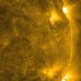 Image: NASA handout photo taken from its Solar Dynamics Observatory (SDO) of two solar flares seen in extreme ultraviolet light over a three day period (2011).
