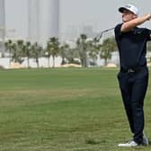 Calum Hill hits his approach shot on the ninth hole in the second round of the Commercial Bank Qatar Masters at Doha Golf Club. Picture: Stuart Franklin/Getty Images.