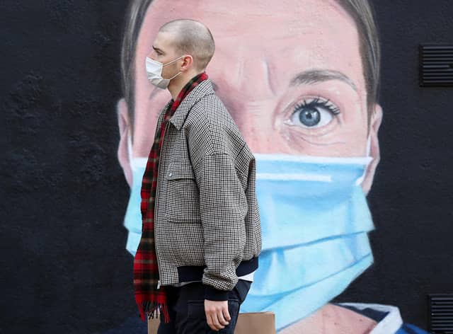 Face masks have become part of everyday life over the past two years (Picture: Martin Rickett/PA)