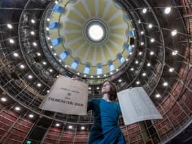 Jocelyn Grant, an archivist with National Records of Scotland, with the original documents of the 1921 census (Picture: National Records of Scotland)