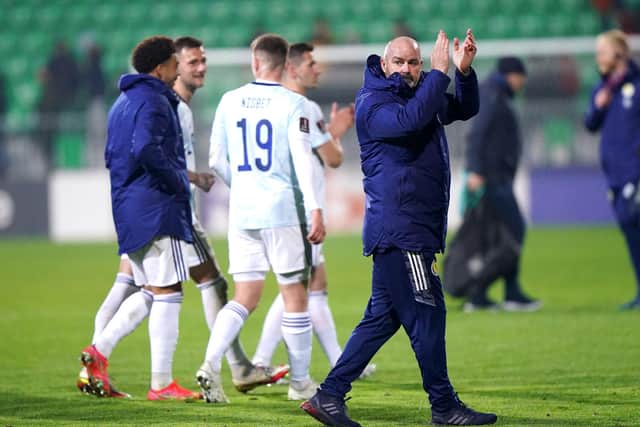 Scotland manager Steve Clarke (right) applauds the fans after the 2-0 win in Moldova secured a World Cup play-off place. (Tim Goode/PA Wire)