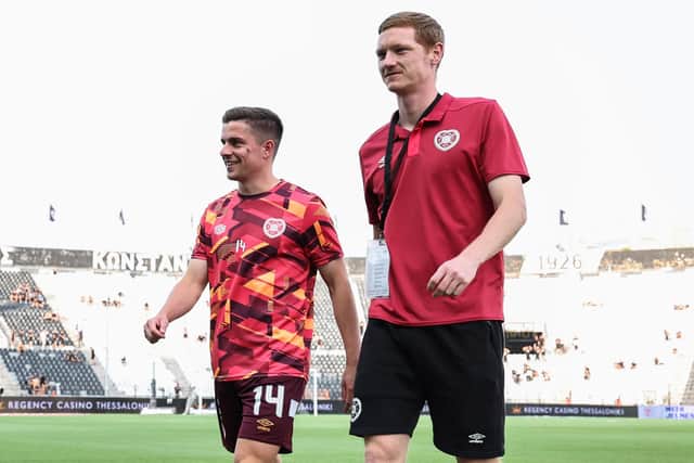 Hearts' Cammy Devlin and Kye Rowles have been picked by the Socceroos for next month's World Cup qualifiers.