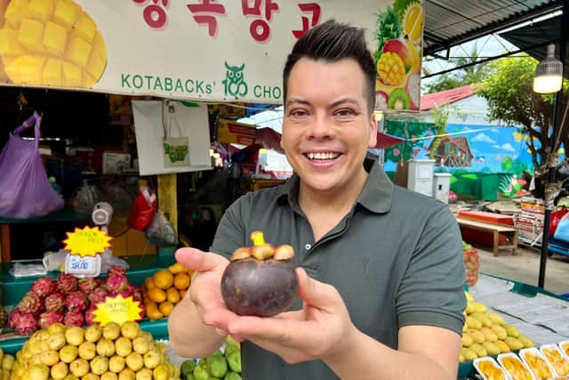 Nick Kwek with a sabah fruit