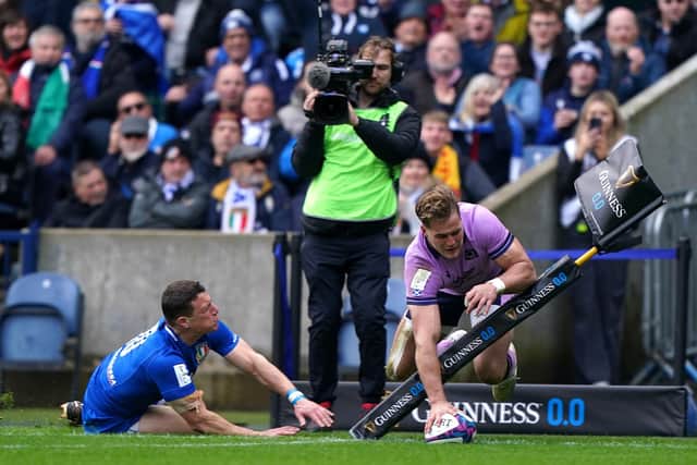 Scotland's Duhan van der Merwe manages to touch the ball down one-handed before hitting the ground. Picture: Andrew Milligan/PA Images