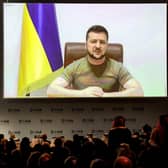 Ukraine's President Volodymyr Zelensky remotely addresses by video-link the Doha Forum in Qatar's capital on March 26, 2022. (Photo by KARIM JAAFAR / AFP) (Photo by KARIM JAAFAR/AFP via Getty Images)