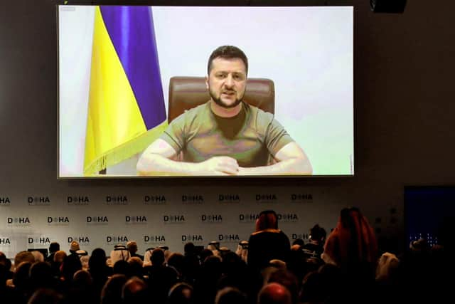 Ukraine's President Volodymyr Zelensky remotely addresses by video-link the Doha Forum in Qatar's capital on March 26, 2022. (Photo by KARIM JAAFAR / AFP) (Photo by KARIM JAAFAR/AFP via Getty Images)