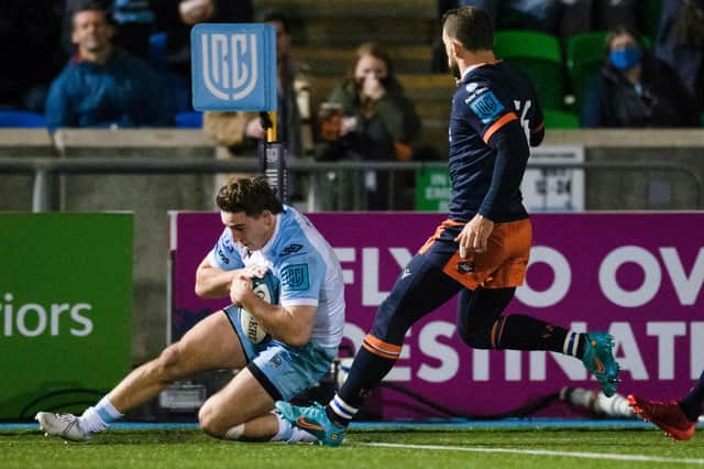 Glasgow's Josh McKay (L) scores a try during a United Rugby Championship match between Glasgow Warriors and Edinburgh Rugby at Scotstoun Stadium, on March 18, 2022, in Glasgow, Scotland. (Photo by Ross MacDonald / SNS Group)