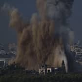 An Israeli airstrike in the Gaza Strip is seen from southern Israel. Picture: Leo Correa/AP