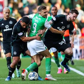Celtic defender Cameron Carter-Vickers wrestles with Hibs striker Dylan Vente for possession.  (Photo by Alan Harvey / SNS Group)