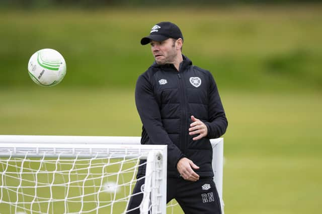 Hearts manager Robbie Neilson during training on Wednesday ahead of the team's flight to Florence.