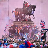 The Rangers title celebrations quickly turned ugly with police officers injured as they struggled to control the mayhem (Picture: Jeff J Mitchell/Getty Images)