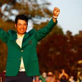 Hideki Matsuyama celebrates after receiving the Green Jacket after winning the 85th Masters at Augusta National Golf Club. Picture: Jared C. Tilton/Getty Images.