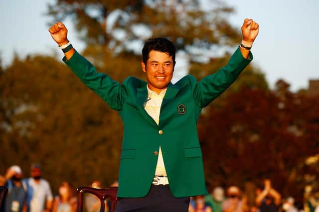 Hideki Matsuyama celebrates after receiving the Green Jacket after winning the 85th Masters at Augusta National Golf Club. Picture: Jared C. Tilton/Getty Images.