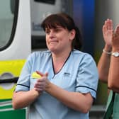 NHS staff clapping for carers in April
