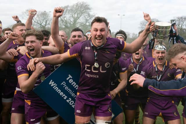 Marr RFC players celebrate with the Tennents Premiership trophy after defeating Currie Chieftains in the play-off final at Mallery Park. (Photo by Mark Scates / SNS Group)