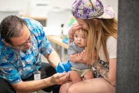 A one year-old receives the MMR vaccine as cases rise (Picture: Jan Sonnenmair/Getty Images)