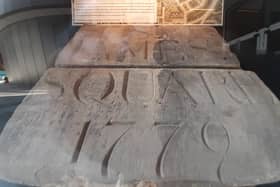 The preserved foundation stone can be seen at the northwest entrance to the centre. An accompanying plaque details the history of the site.