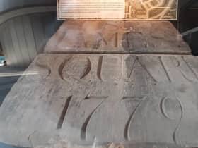 The preserved foundation stone can be seen at the northwest entrance to the centre. An accompanying plaque details the history of the site.