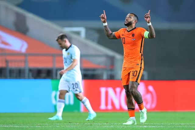 Memphis Depay of Netherlands celebrates scoring during the international friendly between Netherlands and Scotland at Estadio Algarve. (Photo by Fran Santiago/Getty Images)