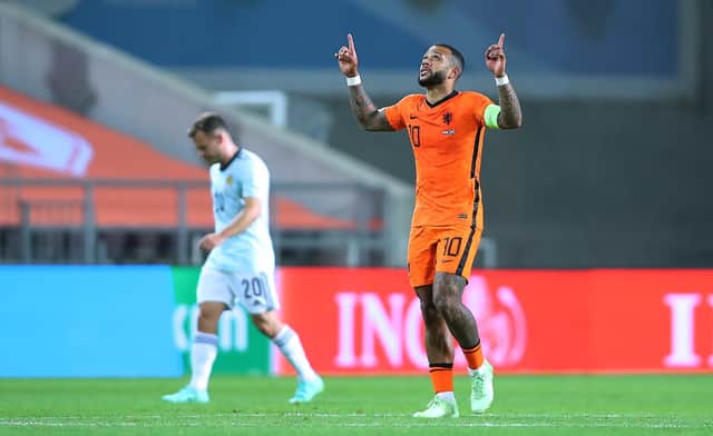 Memphis Depay of Netherlands celebrates scoring during the international friendly between Netherlands and Scotland at Estadio Algarve. (Photo by Fran Santiago/Getty Images)