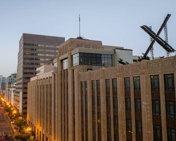 An aerial view shows a newly constructed X sign on the roof of the headquarters of the social media platform previously known as Twitter, in San Francisco.