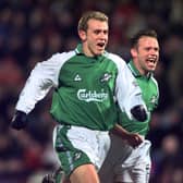 19/12/99 SPL
HEARTS v HIBERNIAN (0-3)
TYNECASTLE - EDINBURGH
Franck Sauzee celebrates alongside Hibernian team-mate John Hughes.