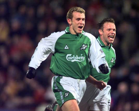 19/12/99 SPL
HEARTS v HIBERNIAN (0-3)
TYNECASTLE - EDINBURGH
Franck Sauzee celebrates alongside Hibernian team-mate John Hughes.