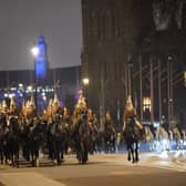 Members of the military in Westminster, central London, during a night time rehearsal for the coronation of King Charles III on May 6.