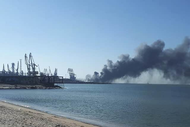 Smoke rises after shelling near Berdyansk port in Ukraine on Thursday. Picture: AP
