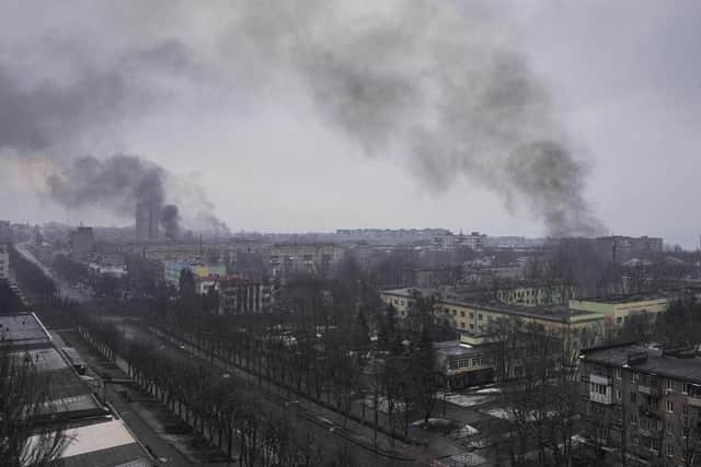 Smoke rises after shelling in Mariupol, Ukraine, March 9, 2022. The UK has warned of a possible use of phosphorus munitions by Russia as fighting intensifies for the besieged Ukrainian city of Mariupol. (AP Photo/Evgeniy Maloletka, File)