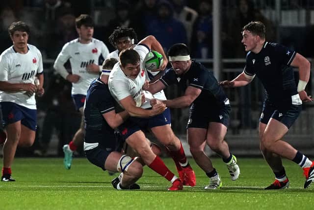 France's hooker Leo Ametlla is tackled by Scotland's defence during the under-20 clash at Hive Stadium.