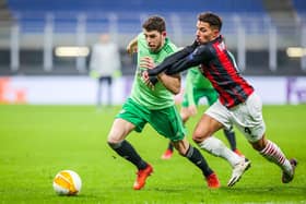 Ryan Christie battles for possession during Celtic's defeat to AC Milan. PIcture: Fabrizio Carabelli/PA Wire.