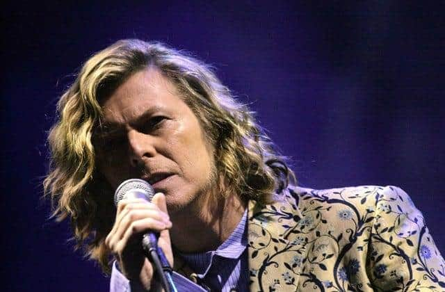 The late David Bowie performing at Glastonbury in 2000.