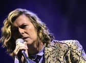 The late David Bowie performing at Glastonbury in 2000.