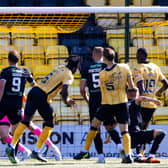 Ayo Obileye heads beyond Hibs goalkeeper David Marshall for a late winner at the Tony Macaroni Arena. Picture: SNS