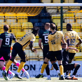Ayo Obileye heads beyond Hibs goalkeeper David Marshall for a late winner at the Tony Macaroni Arena. Picture: SNS