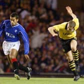 Giovanni van Bronckhorst in action for Rangers against Borussia Dortmund when the clubs last met in European competition in the third round of the UEFA Cup in the 1999-2000 season. (Photo by SNS Group).