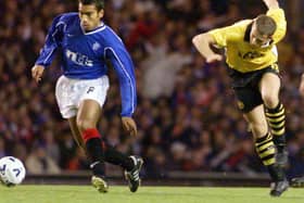 Giovanni van Bronckhorst in action for Rangers against Borussia Dortmund when the clubs last met in European competition in the third round of the UEFA Cup in the 1999-2000 season. (Photo by SNS Group).