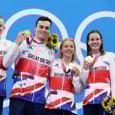 Gold medalists Adam Peaty, James Guy, Anna Hopkin and Kathleen Dawson of Team Great Britain poses during the medal ceremony for the Mixed 4 x 100m Medley Relay Final at Tokyo Aquatics Centre. (Photo by Clive Rose/Getty Images)