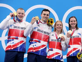 Gold medalists Adam Peaty, James Guy, Anna Hopkin and Kathleen Dawson of Team Great Britain poses during the medal ceremony for the Mixed 4 x 100m Medley Relay Final at Tokyo Aquatics Centre. (Photo by Clive Rose/Getty Images)