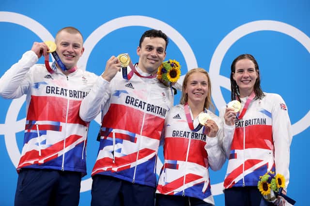 Gold medalists Adam Peaty, James Guy, Anna Hopkin and Kathleen Dawson of Team Great Britain poses during the medal ceremony for the Mixed 4 x 100m Medley Relay Final at Tokyo Aquatics Centre. (Photo by Clive Rose/Getty Images)