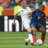 Faye White challenges Marie-Laure Delie of France during the FIFA Women's World Cup 2011 - one of four major tournament appearances for the former Lionesses captain (Photo by Christof Koepsel/Getty Images)