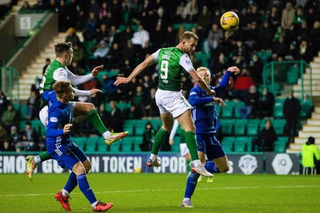 Christian Doidge has a shot on goal during a Scottish Cup Fourth Round tie between Hibernian and Cove Rangers at Easter Road, on January 20, 2022, in Edinburgh, Scotland. (Photo by Craig Foy / SNS Group)