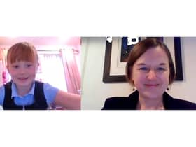 The budding reporter all smiles with NHS Fife public health director Dona Milne whilst asking important questions on Coronavirus.