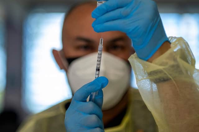 People who are more vulnerable to Covid should be given priority in the queue for vaccination (Picture: Ricardo Arduengo/AFP via Getty Images)