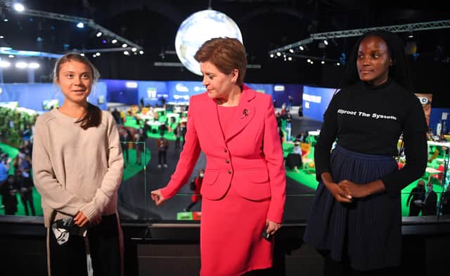 Nicola Sturgeon meets climate activists Vanessa Nakate, right, and Greta Thunberg, left, during the COP26 climate summit (Picture: Andy Buchanan/pool/Getty Images)
