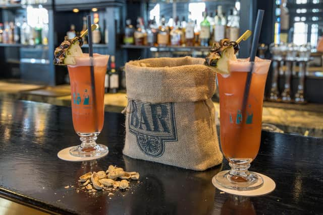 Singapore Slings in the Long Bar, Raffles. Pic: Alamy/PA.