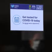 What are the differences between self-isolation exemptions in England and Scotland